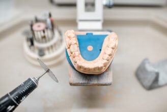 https://veeh.sterling-academy.com/wp-content/uploads/2025/06/dental-technician-working-place-at-the-laboratory-e1750320402537.jpg